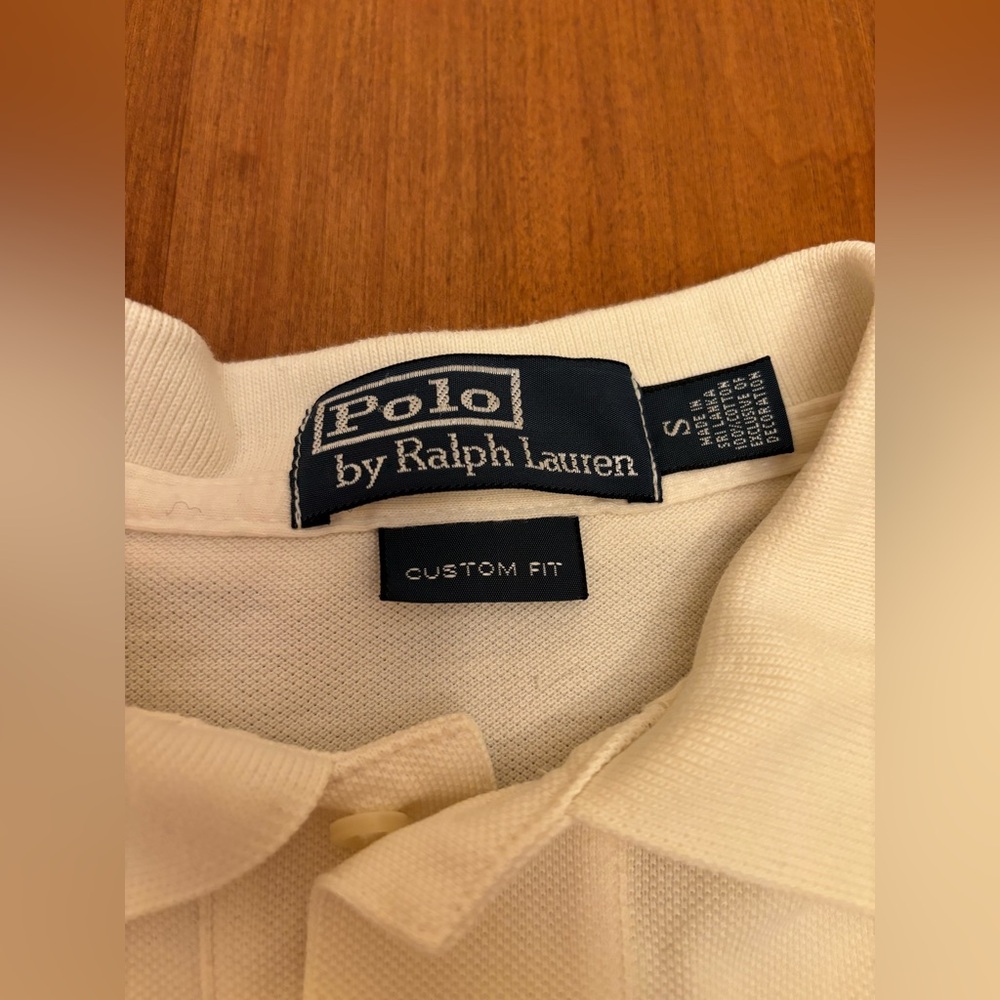 White polo with logo